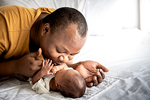 Newborn and father